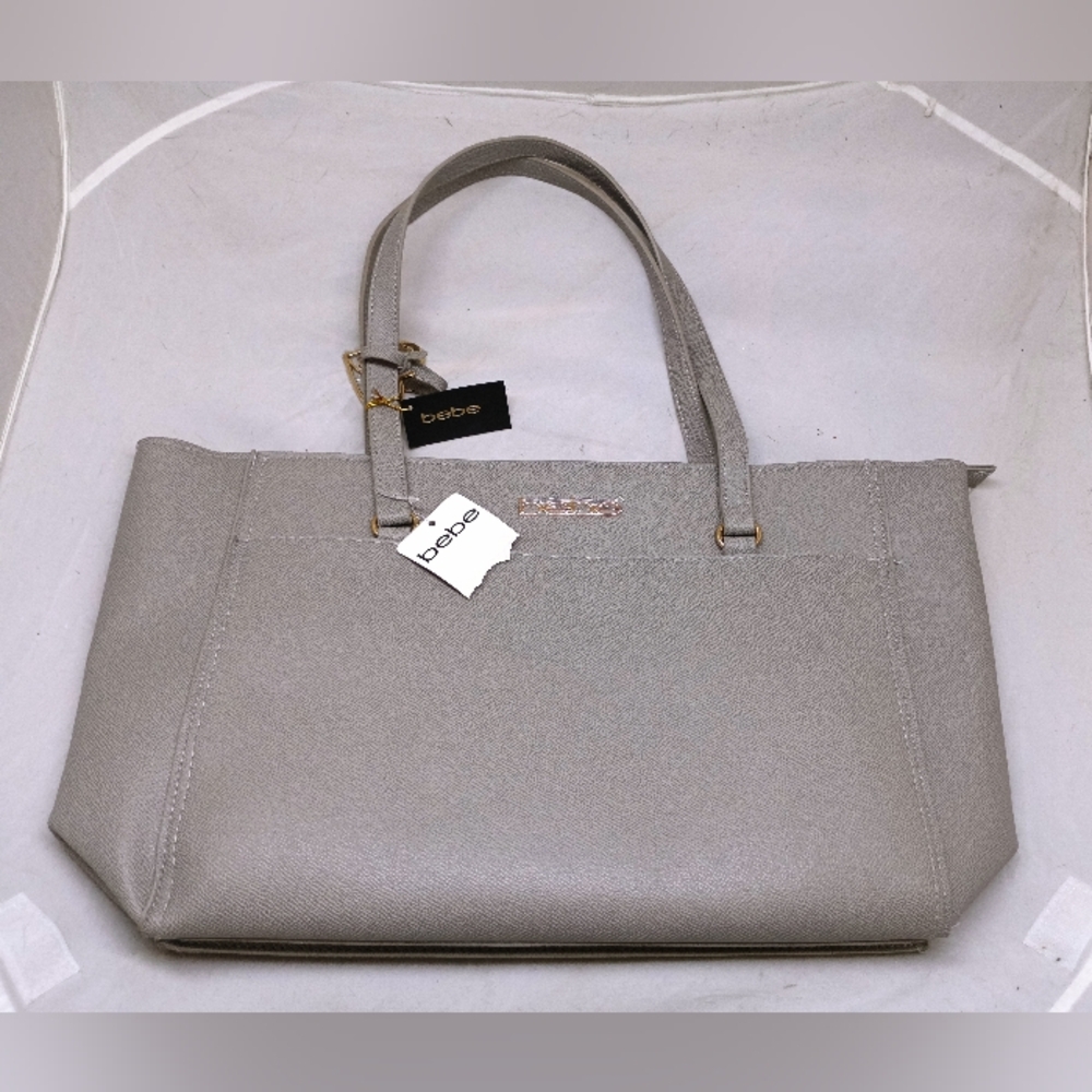NWT BEBE silver tote bag with matching make up bag